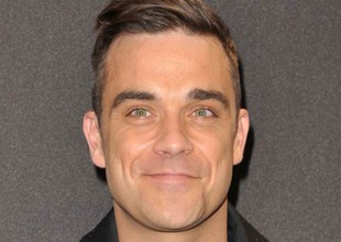Robbie Williams coquetea con una fan menor de edad
